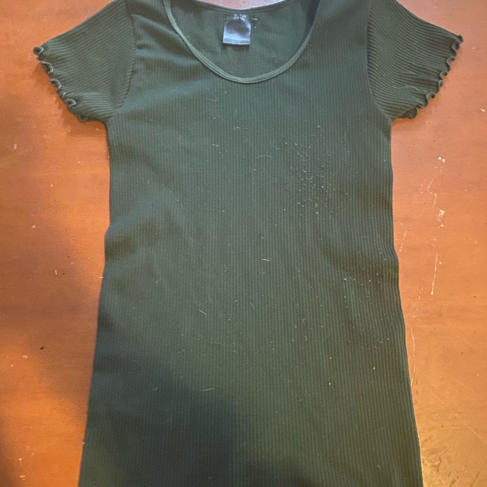 tightly fitted shirt